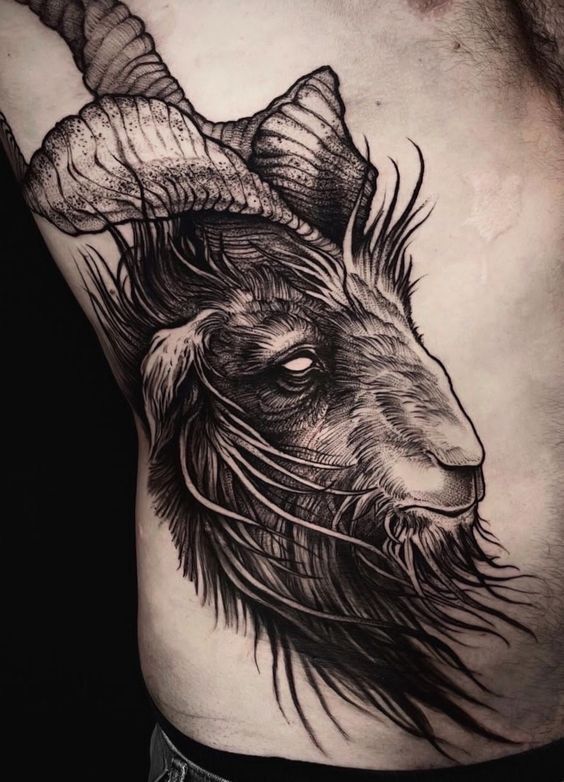 Hình xăm dê phong cách blackwork trên ngực, chi tiết sắc nét, độ phân giải HD.