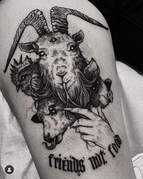 Hình xăm dê ba đầu trên tay, phong cách blackwork chi tiết, độ phân giải HD.