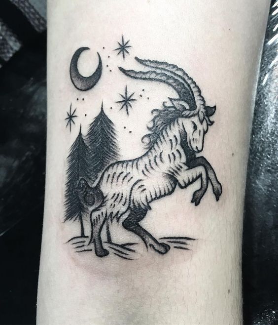 Hình xăm dê đen trắng trên tay, phong cách blackwork, chi tiết tinh tế, độ phân giải HD.