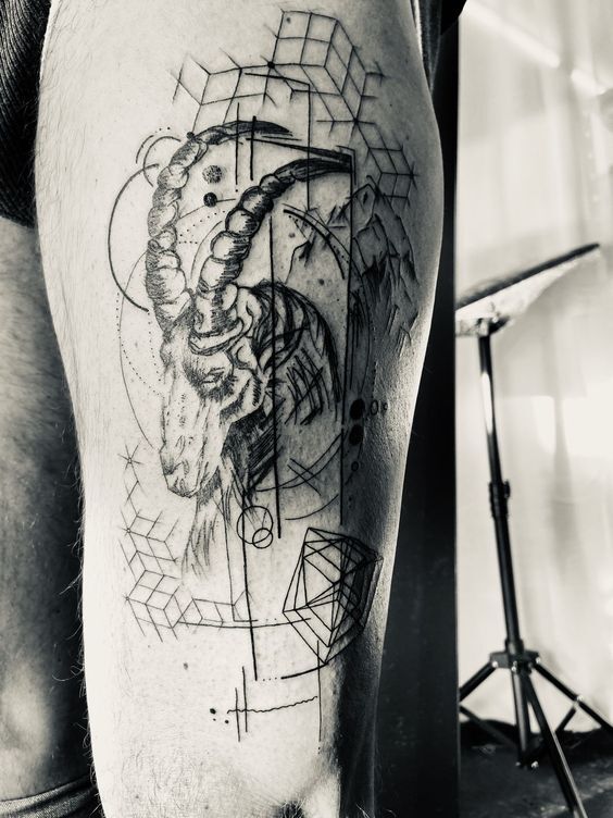 Hình xăm đầu dê phong cách hình học trên bắp tay, chi tiết phức tạp, phong cách blackwork, ảnh HD.