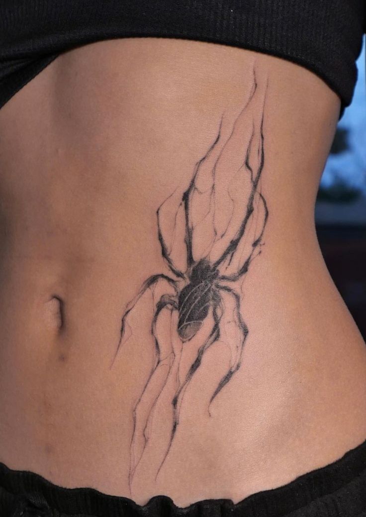 Hình xăm nhện blackwork trên eo, phong cách tối giản, chi tiết rõ nét, ảnh HD.