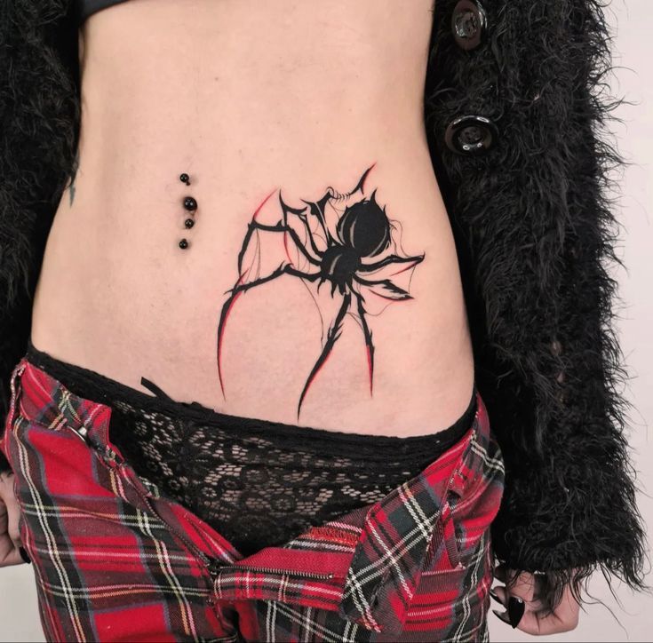 Hình xăm nhện đen trên eo, phong cách blackwork, chi tiết rõ nét, ảnh HD.