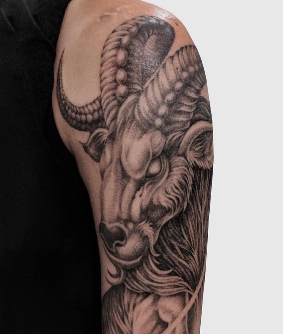 Hình xăm dê trên cánh tay, phong cách blackwork chi tiết, độ phân giải HD.