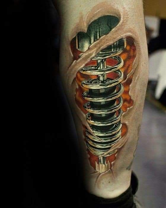 ấn tượng với mẫu xăm phuộc ohlins lạ mắt Hình xăm 3D lò xo cơ khí trên bắp chân, phong cách hiện thực, chi tiết sắc nét, độ phân giải HD.