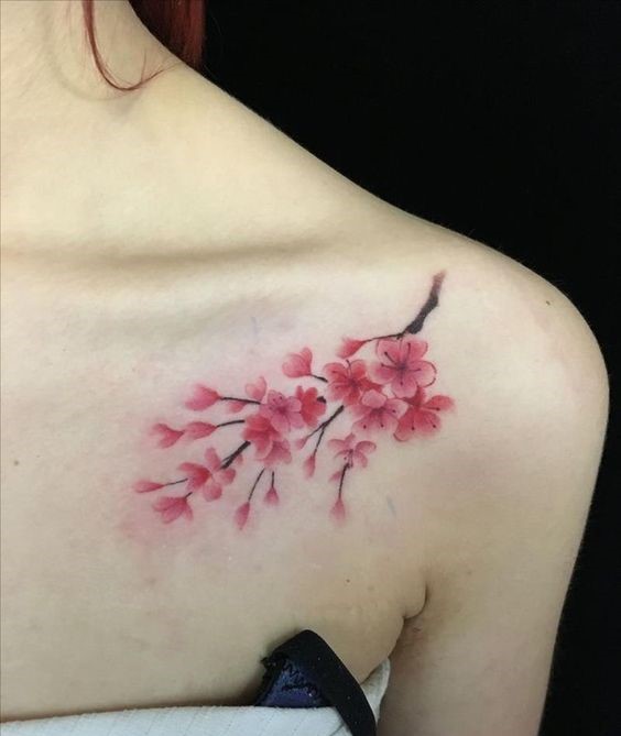 xăm hoa đào nở rộ cực đẹp cho nữ Hình xăm hoa anh đào trên vai, phong cách màu nước, chi tiết tinh tế, ảnh HD.