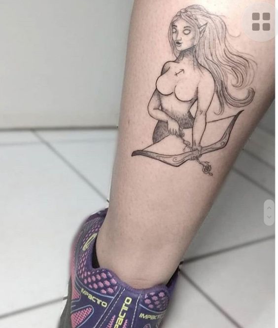 hình xăm cung nhân mã Hình xăm tiên nữ trên bắp chân phong cách blackwork, chi tiết rõ nét, ảnh HD.