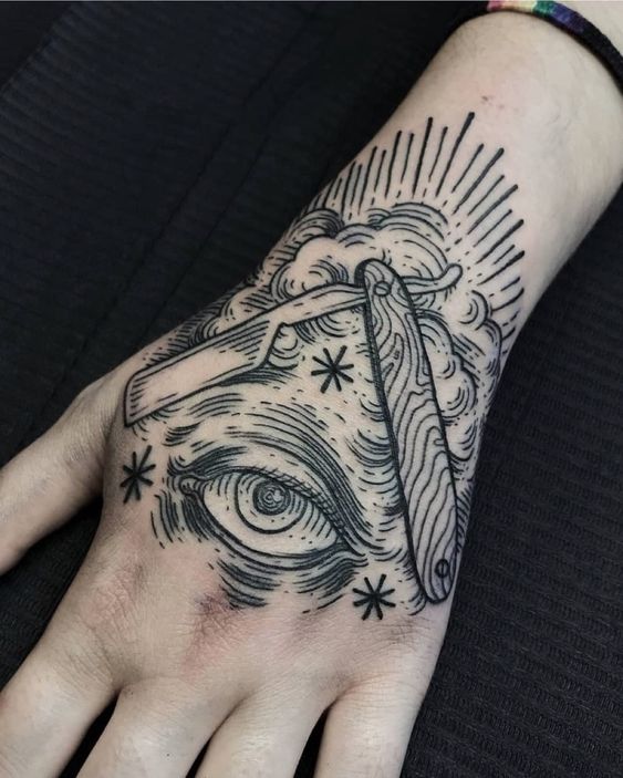 mê mẫn hoa văn ở bàn tay cho thợ cắt tóc Hình xăm dao cạo và mắt phong cách blackwork trên mu bàn tay, chi tiết rõ nét, ảnh HD.