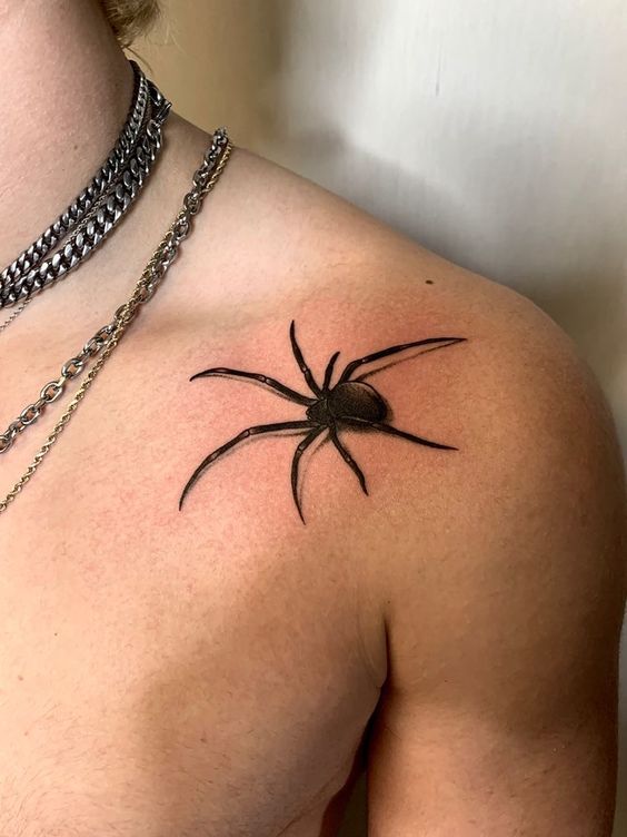 Hình xăm nhện blackwork trên vai, chi tiết rõ nét, ảnh HD.