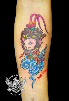 ngộ không mini cực chiến ở tay Hình xăm Tôn Ngộ Không phong cách màu sắc trên cánh tay, chi tiết rõ nét, ảnh HD.