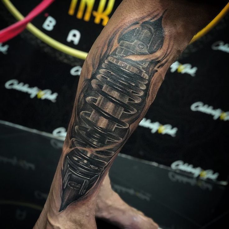 tattoo cẳng chân hình phuộc xe Hình xăm lò xo trên bắp chân, phong cách blackwork chi tiết, ảnh HD 736x736.