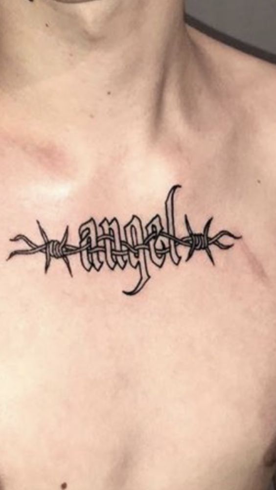 Hình xăm chữ "angel" phong cách blackwork trên ngực, độ phân giải HD, chi tiết sắc nét.