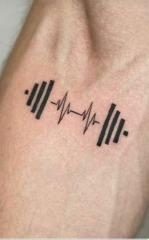 Hình xăm tạ đòn trên tay, phong cách blackwork, chi tiết đơn giản, độ phân giải HD.