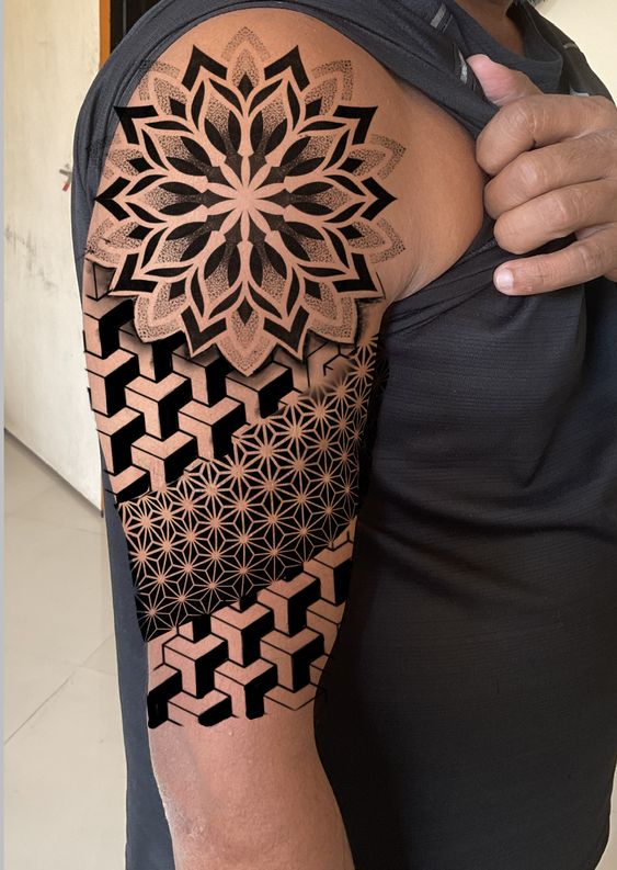 Hình xăm hình học blackwork trên cánh tay, chi tiết tinh xảo, phong cách hiện đại, ảnh HD.