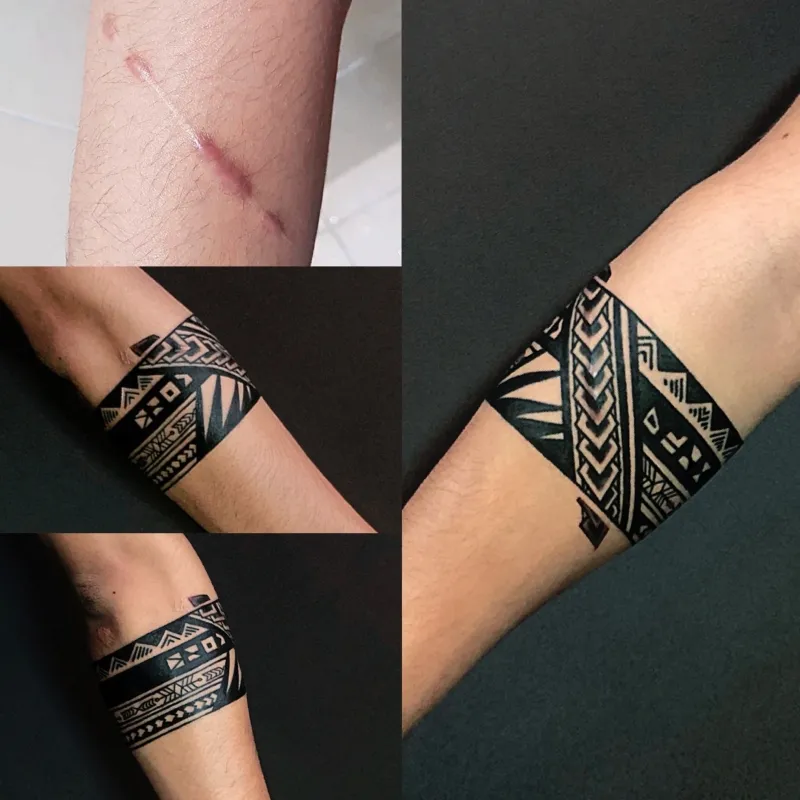 Hình xăm tribal trên cánh tay, phong cách blackwork, chi tiết rõ nét, ảnh HD.