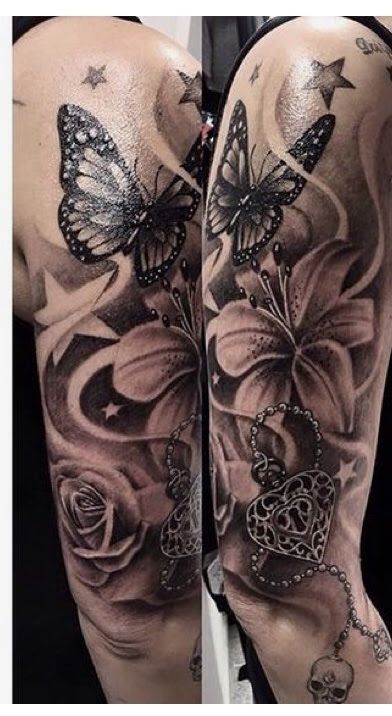 Hình xăm hoa và bướm phong cách blackwork trên cánh tay, chi tiết tinh xảo, độ phân giải HD.