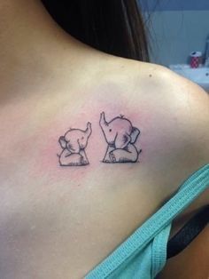 Hình xăm voi mini trên vai, phong cách blackwork, độ chi tiết cao, ảnh HD.