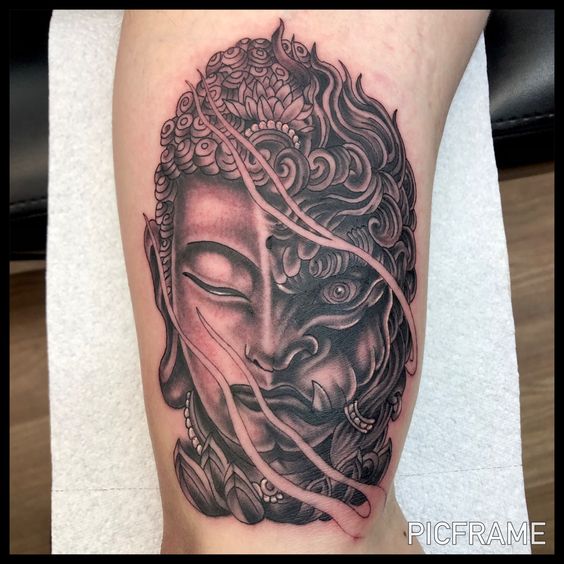 Hình xăm nửa Phật nửa quỷ trên tay chất lượng Hình xăm Phật và quỷ, phong cách blackwork chi tiết, vị trí trên tay, độ phân giải HD.
