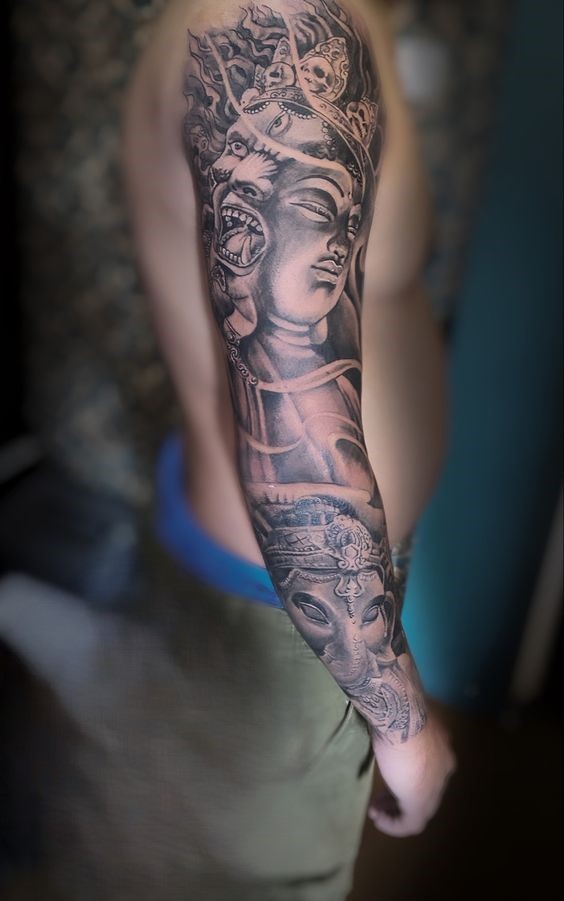 Hình xăm Phật quỷ đẹp cho khách hàng Hình xăm thần Hindu chi tiết trên cánh tay, phong cách blackwork, độ phân giải HD.
