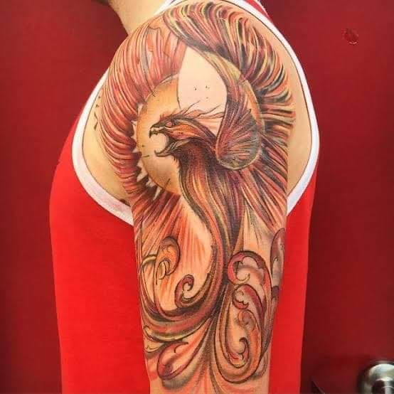 Hình xăm phượng hoàng vỗ cánh tuyệt đẹp Hình xăm phượng hoàng trên vai, phong cách màu sắc chi tiết, độ phân giải HD.