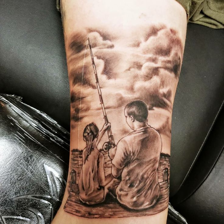 Hình tattoo con gái câu cá cùng bố Hình xăm cảnh câu cá, bắp tay, phong cách blackwork chi tiết, ảnh HD.