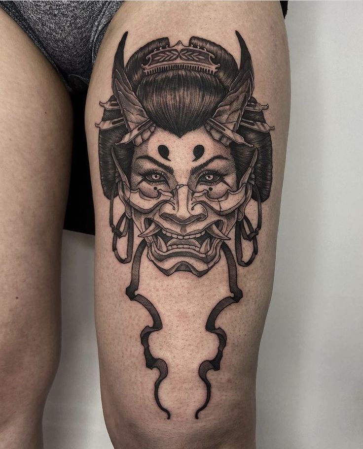 Hình xăm mặt nạ Oni, đùi, phong cách blackwork, chi tiết cao, ảnh HD.