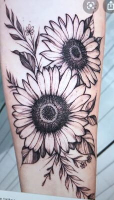 tattoo bông hoa hướng dương điệu nghệ Hình xăm hoa hướng dương trên cánh tay, phong cách blackwork chi tiết, độ phân giải HD.