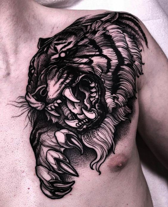 Hình xăm hổ phong cách blackwork trên ngực chi tiết rõ nét, độ phân giải HD.