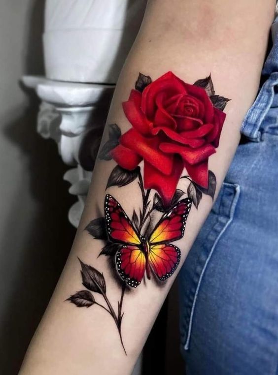 Tattoo hoa hồng kết hợp bướm dành cho nữ Hình xăm hoa hồng và bướm trên tay, phong cách màu sắc sống động, chi tiết tinh xảo, độ phân giải HD.