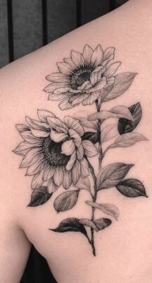 tattoo hướng dương siêu nghệ Hình xăm hoa hướng dương trên vai, phong cách blackwork, chi tiết rõ nét, ảnh HD.