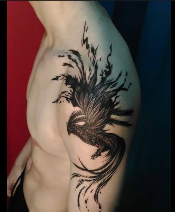 Tattoo phượng hoàng màu đen cực ngầu Hình xăm phượng hoàng blackwork trên bắp tay, chi tiết sắc nét, hình ảnh HD.