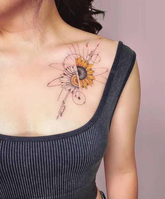 tattoo mini hoa hướng dương phá cách Hình xăm hoa hướng dương ở vai, phong cách màu nước, chi tiết tinh tế, ảnh độ phân giải cao.