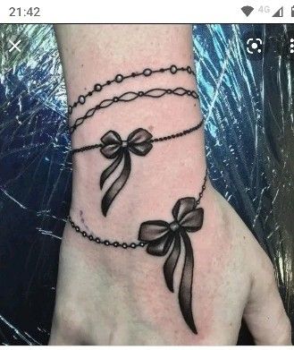 Dây nơ dạng vòng tay cho nữ Hình xăm nơ cổ tay, phong cách blackwork, chi tiết tinh xảo, ảnh HD.