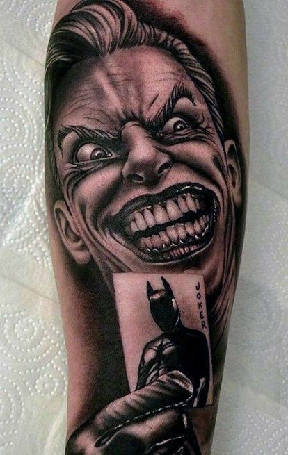 Hình xăm Joker trên tay, phong cách blackwork chi tiết, độ phân giải HD.