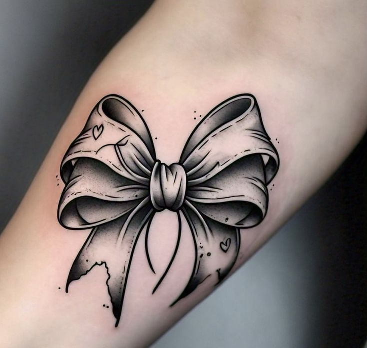 Thiết kế hình xăm nơ lớn Hình xăm nơ trên tay phong cách blackwork, chi tiết, độ phân giải HD.