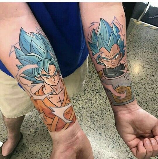 Hình xăm anime trên cánh tay, phong cách màu sắc, chi tiết rõ nét, độ phân giải HD.