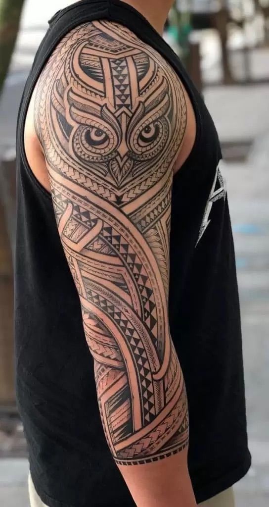 Hình xăm cú trên tay, phong cách tribal chi tiết, ảnh HD.